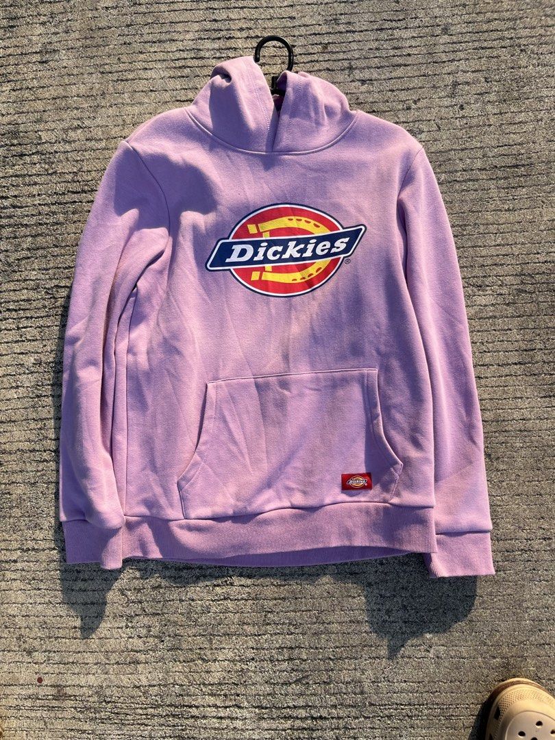 Dickies Purple Pullover Hoodie Size 150/72 (Category: Coats, Jackets and Outerwear) located in Manila. Submitted by mr.swag757 (Listing ID 1465676044, Image 1). Description: - Authentic Dickies hoodie in a trendy light purple / lavender shade - Size: 150/72 (fits youth large / petite adult) - Bold graphic Dickies logo printed on the chest - Classic kangaroo pocket with iconic red logo tab - Attached hood with long sleeves, ribbed cuffs, and hem -