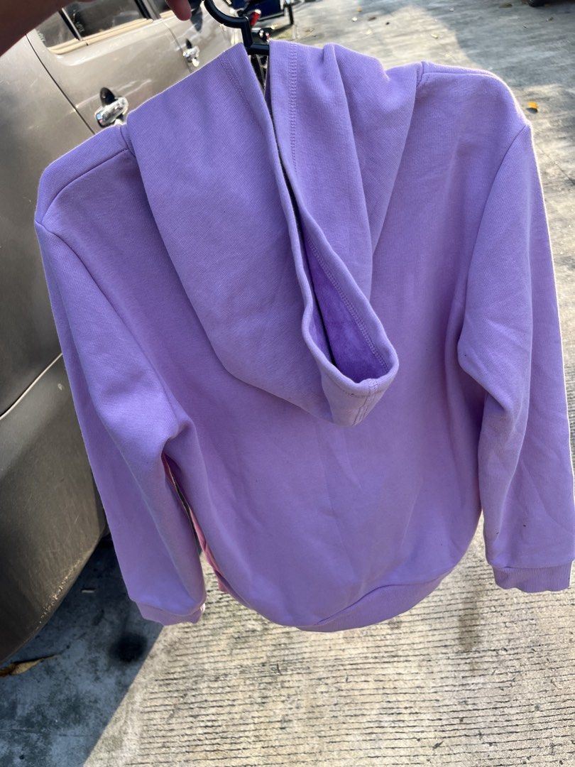 Dickies Purple Pullover Hoodie Size 150/72 (Category: Coats, Jackets and Outerwear) located in Manila. Submitted by mr.swag757 (Listing ID 1465676044, Image 2). Description: - Authentic Dickies hoodie in a trendy light purple / lavender shade - Size: 150/72 (fits youth large / petite adult) - Bold graphic Dickies logo printed on the chest - Classic kangaroo pocket with iconic red logo tab - Attached hood with long sleeves, ribbed cuffs, and hem -