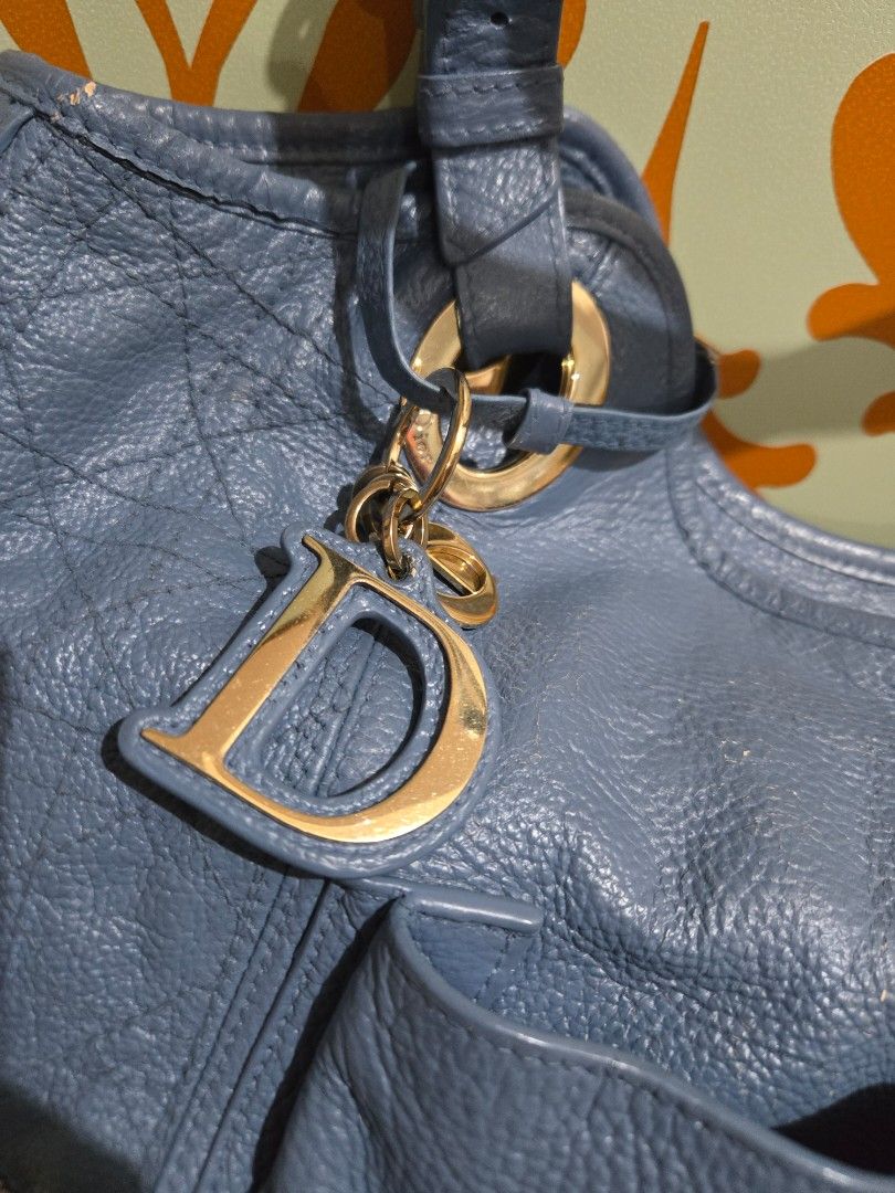 Christian Dior Cannage Bee Hobo Bag (Category: Luxury Bags & Wallets) located in Mandaluyong City. Submitted by savysmarty (Listing ID 1465690623, Image 2). Description: authentic, professionally recolored with cracks, dry leather negotiable MOP Gcash SF c/o buyer.