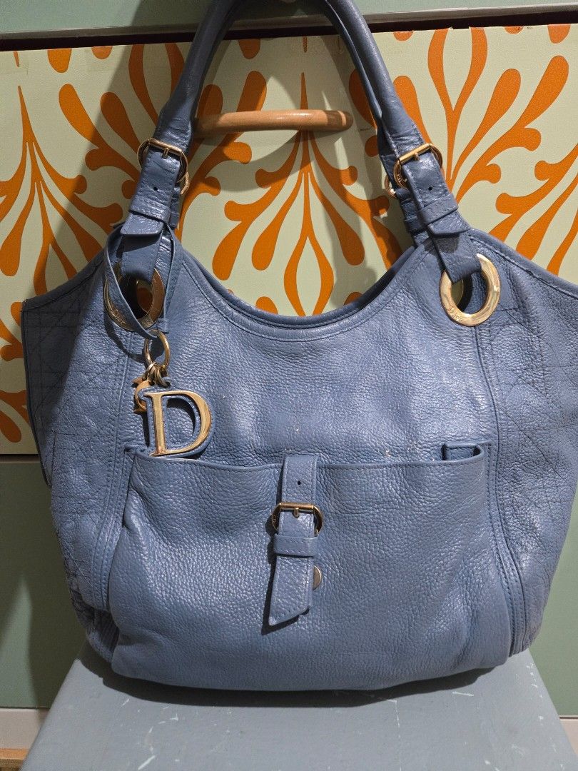 Christian Dior Cannage Bee Hobo Bag (Category: Luxury Bags & Wallets) located in Mandaluyong City. Submitted by savysmarty (Listing ID 1465690623, Image 1). Description: authentic, professionally recolored with cracks, dry leather negotiable MOP Gcash SF c/o buyer.