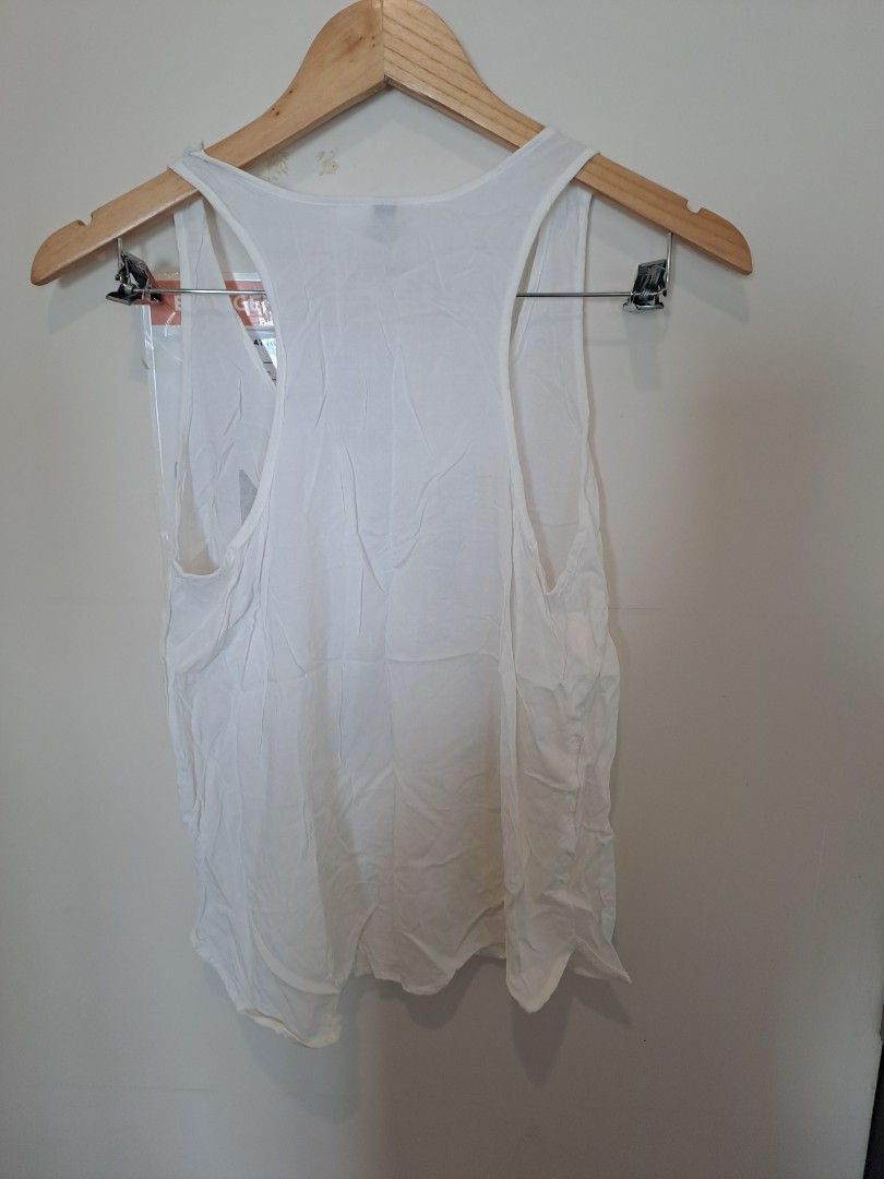 Divided by H&M for free (Category: Sleeveless) located in Manila. Submitted by joanbalde39643 (Listing ID 1465664770, Image 3). Description: any purchase this only for free.