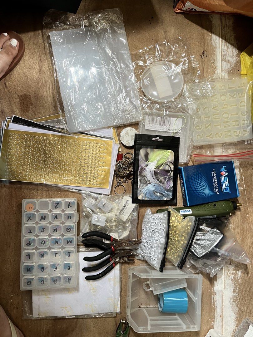 DIY Crafting Supplies Bundle with Molds Beads and Tools (Category: Craft Supplies & Tools) located in Taytay. Submitted by janellacel (Listing ID 1465716529, Image 2). Description: - Massive all-in-one crafting bundle for resin projects, jewelry making, and stationery - Molds & Tools: Silicone notebook & coaster molds, electric drill set, and pliers - Hardware & Accents: Tassels, keychains, fairy lights, and letter beads - Stickers & Letters: Mul