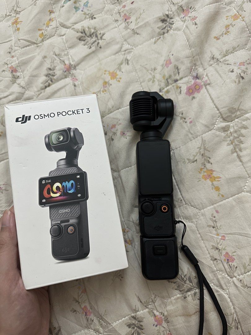 DJI Osmo Pocket 3 Standard (Category: Video Cameras) located in Manila. Submitted by lupazanne (Listing ID 1465603770, Image 2). Description: DJI Osmo pocket 3 standard - With case and pouch - no memory card included - under warranty till September 2027 - Slightly negotiable - Bought last September from the DJI Store at SM MOA. Used only for travel and vlogging Comes with the original receipt and is still under warranty. - Meetup near my loc or l