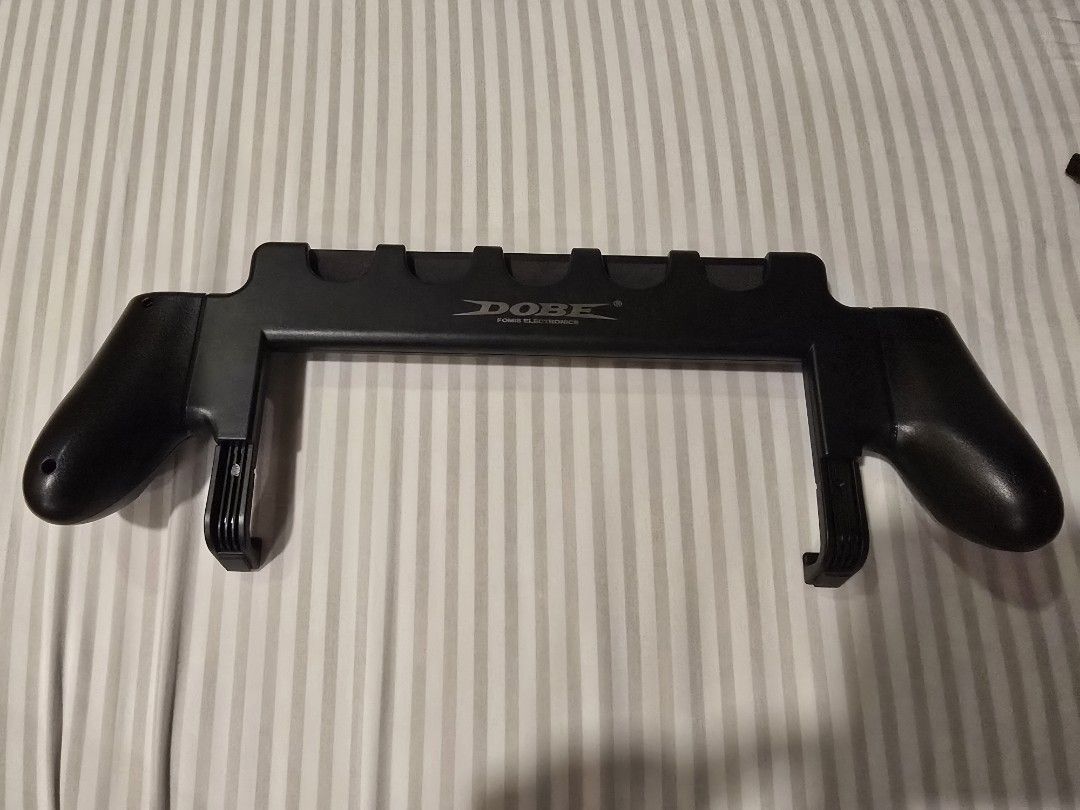 DOBE Grip for Nintendo Switch 2 and Slim Carry Case (Category: Controllers) located in Baguio. Submitted by joccsells (Listing ID 1465619338, Image 2). Description: Dobe Switch 2 slim case - P280 Dobe Switch 2 grip - P370 Bundle case + grip - P600.