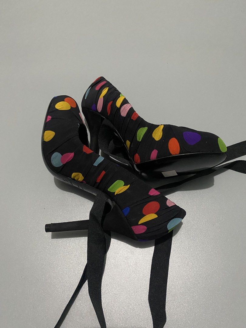 Dolce & Gabbana black fabric high heel pumps (Category: Sneakers & Footwear) located in Cebu City. Submitted by dfindss. (Listing ID 1465608979, Image 3). Description: D&G Dolce & Gabbana black fabric high heel pumps featuring a colorful multicolor polka dot pattern and ribbon tie details..