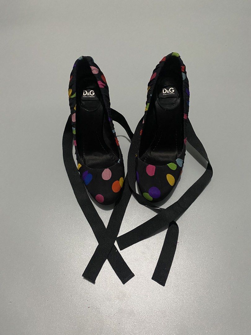 Dolce & Gabbana black fabric high heel pumps (Category: Sneakers & Footwear) located in Cebu City. Submitted by dfindss. (Listing ID 1465608979, Image 1). Description: D&G Dolce & Gabbana black fabric high heel pumps featuring a colorful multicolor polka dot pattern and ribbon tie details..
