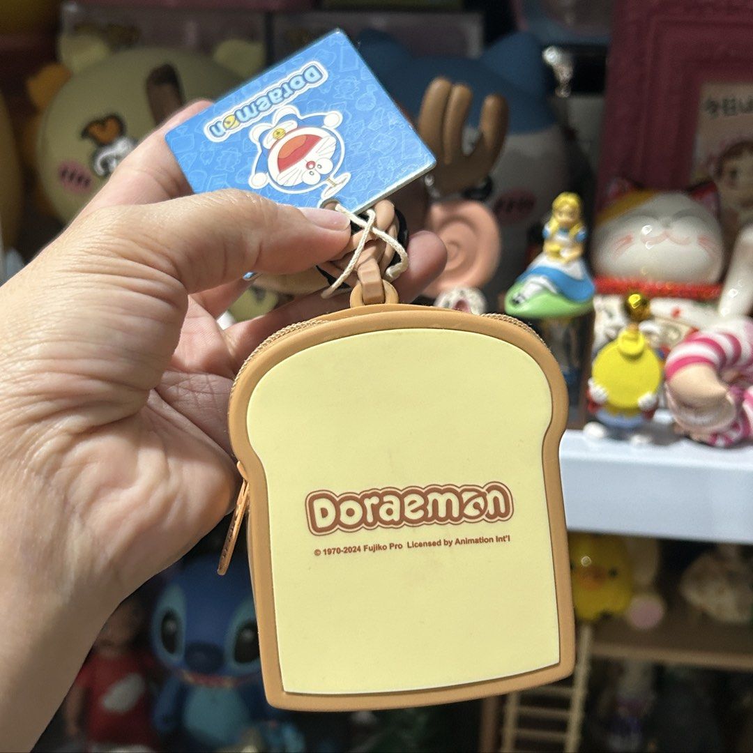 Doraemon Silicon Coin Purse (Category: Plushies & Soft Toys) located in Quezon City. Submitted by kitsune.treasures (Listing ID 1465596136, Image 3). Description: *First to pay policy! *1 day reservation only. Failure to pay on time, auto cancel. 📍Quezon City * MOD: J&T | Lalamove * MOP: GCASH | BPI 📦ON HAND AND READY TO SHIP! CONDITION: WHAT YOU SEE IS WHAT YOU GET. Dimensions: Kindly check the photos for the actual measurements. Please check 