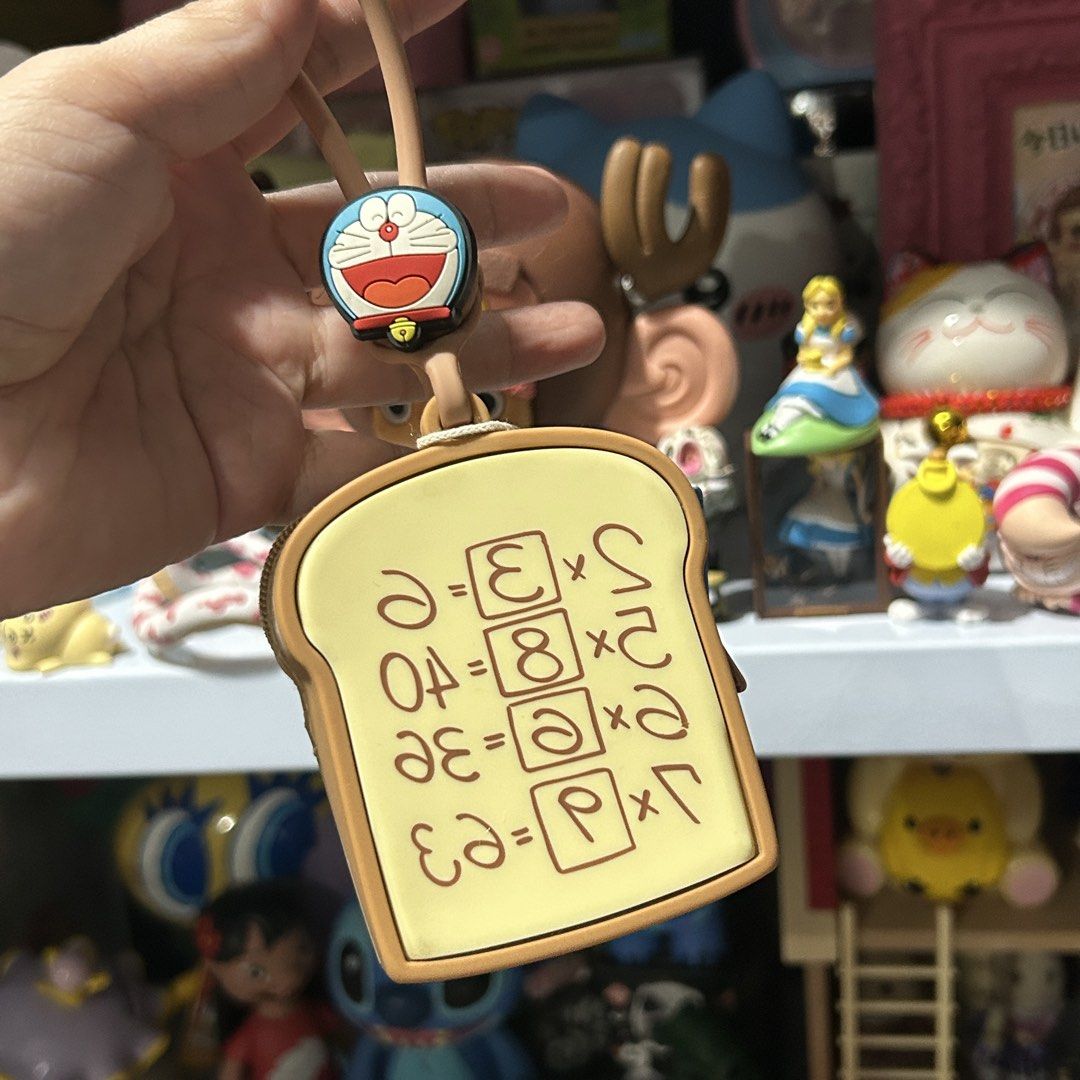 Doraemon Silicon Coin Purse (Category: Plushies & Soft Toys) located in Quezon City. Submitted by kitsune.treasures (Listing ID 1465596136, Image 2). Description: *First to pay policy! *1 day reservation only. Failure to pay on time, auto cancel. 📍Quezon City * MOD: J&T | Lalamove * MOP: GCASH | BPI 📦ON HAND AND READY TO SHIP! CONDITION: WHAT YOU SEE IS WHAT YOU GET. Dimensions: Kindly check the photos for the actual measurements. Please check 