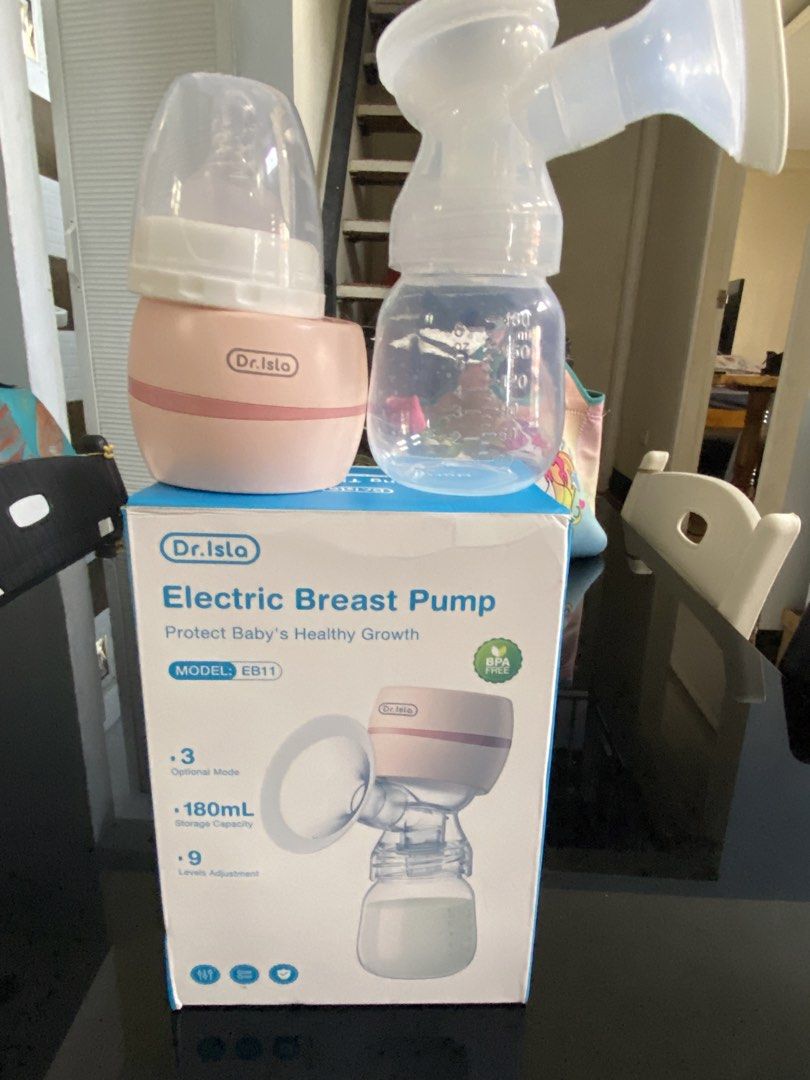 Dr. Isla Electric Breast Pump Model EB11 (Category: Breastfeeding & Bottle Feeding) located in Manila. Submitted by king_1989 (Listing ID 1465591275, Image 2). Description: - Brand/Model: Dr. Isla Electric Breast Pump (EB11) - Condition: Complete with original box - Features: 3 optional modes and 9 adjustable levels for comfort - Capacity: 180ml storage capacity - Safety: 100% BPA-free materials - Inclusions: Main pump unit, collection bottle, an
