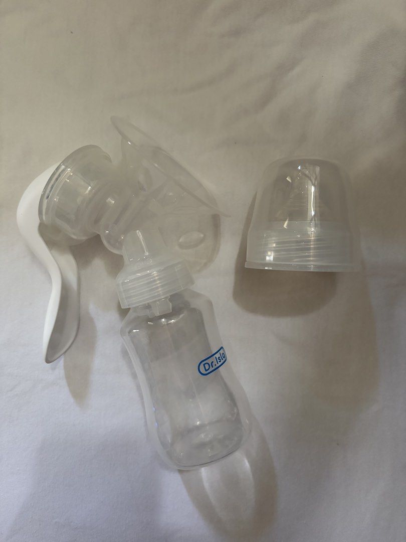dr.isla Manual Breast Pump with Bottle (Category: Breastfeeding & Bottle Feeding) located in Santa Rosa. Submitted by chrsthings (Listing ID 1465613648, Image 1). Description: - Brand: Dr. Isla - Type: Manual breast pump - Inclusions: Clear feeding bottle, white pump handle, and protective cap - Condition: Sterilized, carefully packed, and ready to use - Features: Easy to assemble and clean - Ideal use: Great and handy backup option for expressin