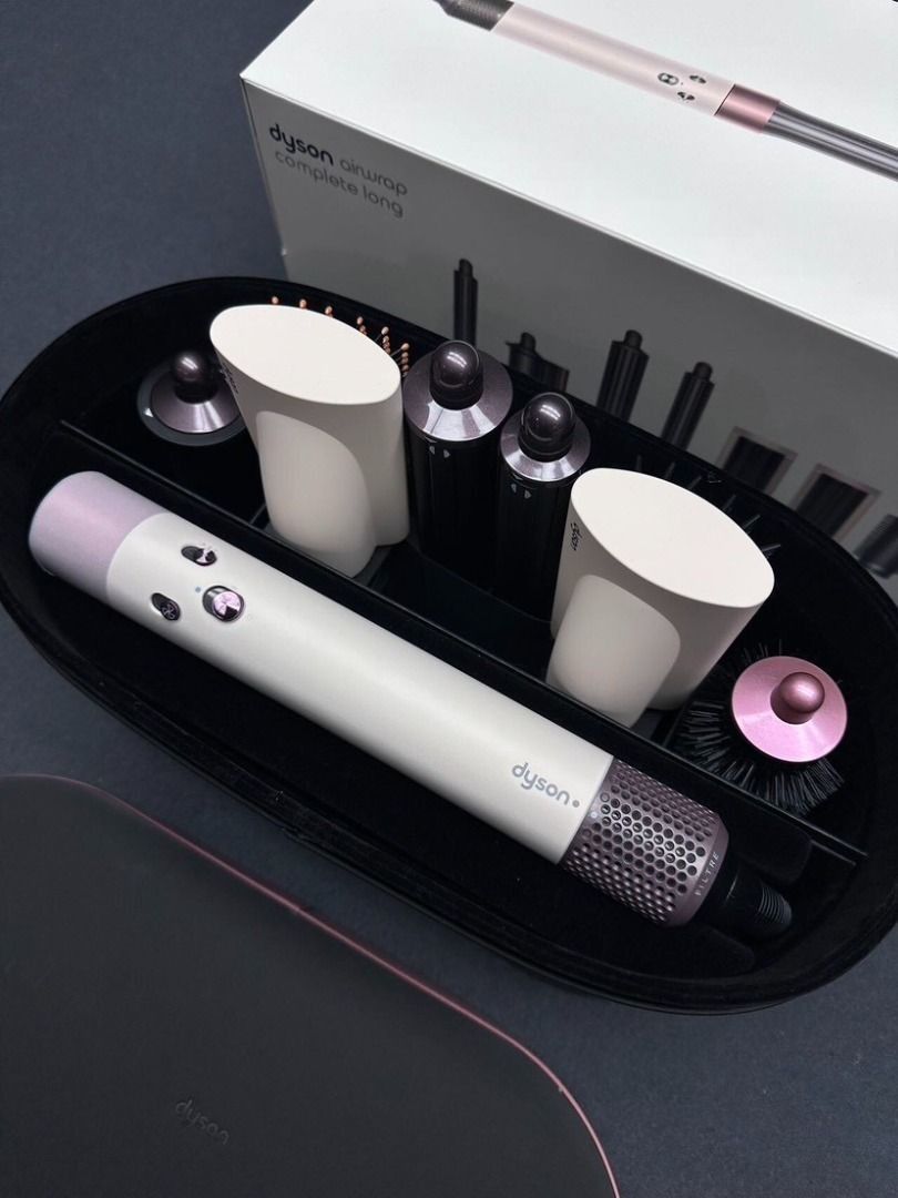 Dyson Airwrap Complete Long HS05 (Category: Hair) located in Paranaque City. Submitted by swiftriver-f167a7 (Listing ID 1465667751, Image 1). Description: - Complete multi-styler set in White and Rose Gold - Includes barrel attachments, smoothing brushes, and round volumizing brush - Comes with original presentation case and outer box - Handle mechanism and buttons in clean working order - All attachments accounted for and stored neatly inside ve