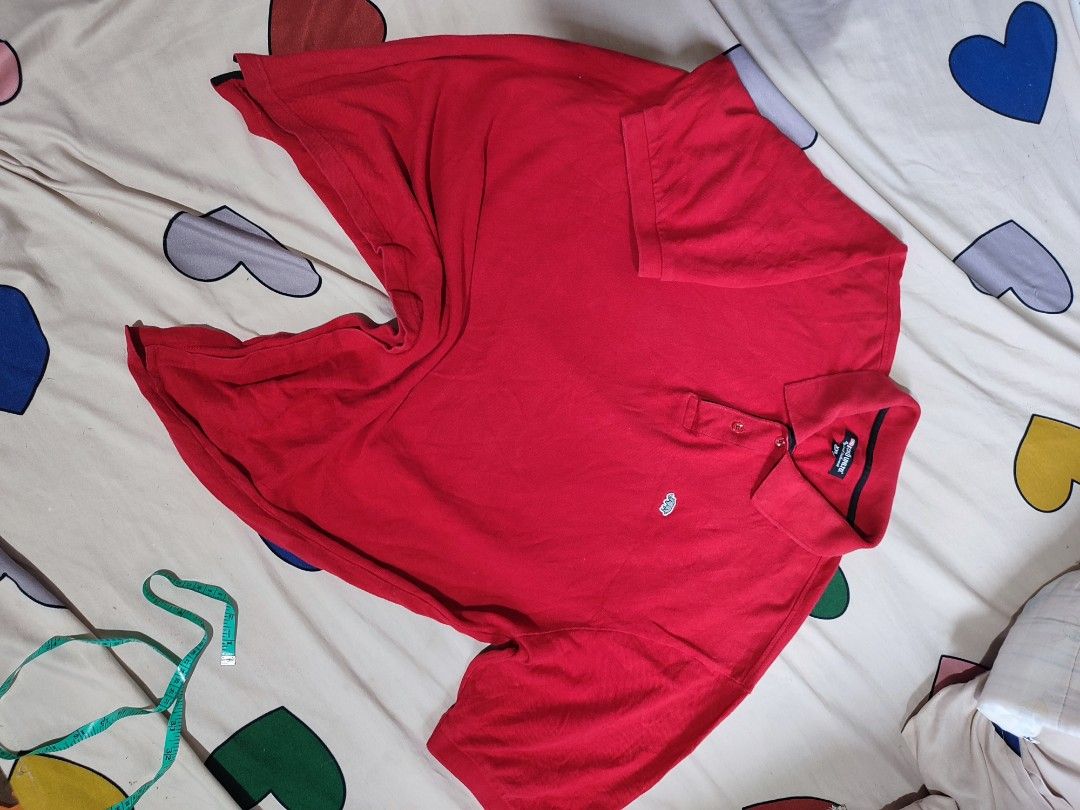 Ecko Unltd Red Polo Shirt XXL (Category: Tshirts & Polo Shirts ) located in Manila. Submitted by mommyregsthriftclothes (Listing ID 1465632309, Image 2). Description: - Brand: Ecko Unltd - Color: Bright Red - Size: XXL - Material/Origin: Made in India - Details: Embroidered rhino logo on chest, small rhino tag on back collar, classic collar with 3-button placket, black contrast tape inside neckline - Condition: Classic casual staple, great for ev