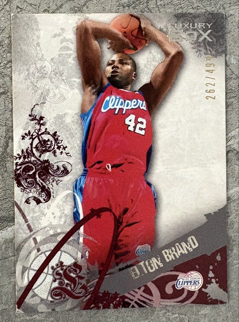 Elton Brand Numbered to 499 (Category: Raw Singles) located in Manila. Submitted by steadycards80 (Listing ID 1465580526, Image 1). Description: - Player: Elton Brand (Los Angeles Clippers / Duke University) - Set: Topps Luxury Box - Card Number: #30 - Serial Number: 262/499 (located on front right corner) - Features: Player bio and 7-season career highlights on the back - Size: Standard trading card - with corner and surface issues.
