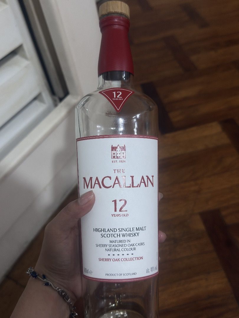 Empty Macallan 12 bottle (sherry oask cask) (Category: Figurines & Statues) located in Manila. Submitted by gaitanruss52463 (Listing ID 1465686429, Image 1). Description: Empty bottle macallan 12, Malinis ang loob walang basag,kaka open lang kahapon, at buo ang label,(no box) its good for decoration, DIY lamp o decorations..
