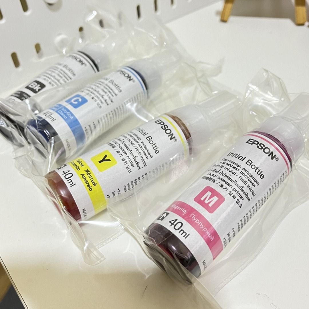Epson Initial Bottle Ink Refill 40ml Set of 4 L121 PRINTER Epson T664 ink (Category: Printers, Scanners & Copiers) located in Bacoor. Submitted by thriftwithayenn (Listing ID 1465698412, Image 1). Description: - Set of 4 Epson initial ink refill bottles: Black, Cyan, Yellow, and Magenta - Capacity: 40ml per bottle - Condition: Brand new, still sealed in original plastic packaging - Source: Unused from a printer purchase -LAST PRICE POSTED- 😊🙏🏼