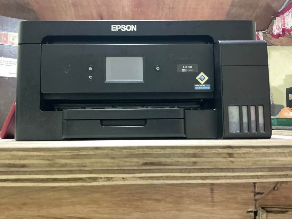 Epson L14150 Printer - ₱20,000 (Category: Printers, Scanners & Copiers) located in Caloocan City. Submitted by boldphoenix.4ad14b (Listing ID 1465708462, Image 1). Description: Selling our Epson L14150, purchased in July 2023 and originally bought for ₱30,500. It supports A4, Short/Letter, Long/Legal, A3, and A3+ paper sizes, making it suitable for printing businesses, offices, students, and general home or business use. ✅ Touchscreen display for