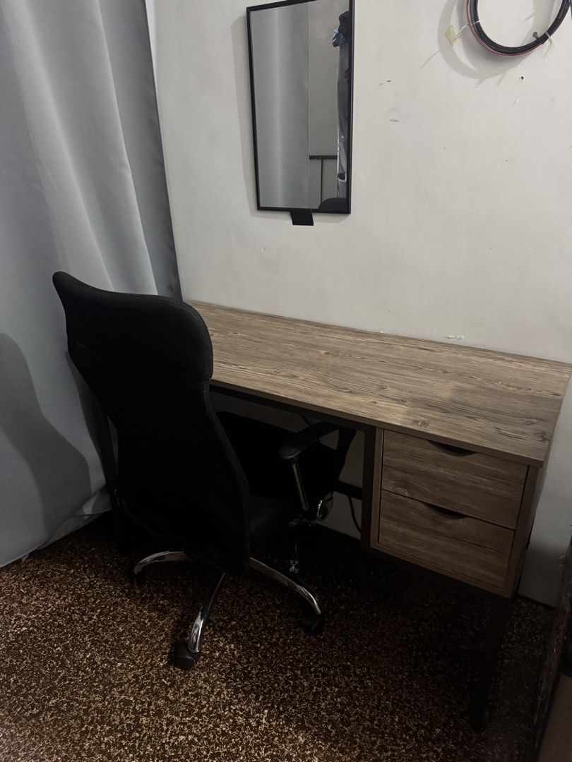 Ergonomic Mesh Office Chair (Category: Office Furniture & Fixtures) located in Taguig. Submitted by johnsteven22 (Listing ID 1465608371, Image 2). Description: - Complete home office setup: Black mesh high-back chair & matching study desk - Chair features: Rolling wheels, chrome base, and adjustable armrests - Condition: Clean, well-maintained, with minimal wear - Ideal for: Home office, bedroom workspace, or student study area - Location/Deliver