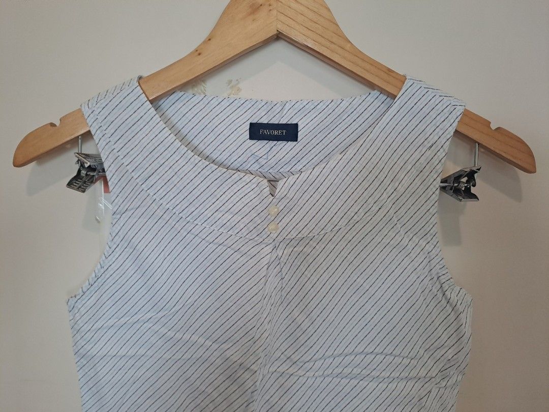 Favorite sleeveless (Category: Sleeveless) located in Manila. Submitted by joanbalde39643 (Listing ID 1465605788, Image 2). Description: This is favorite xs.. a lightweight, striped sleeveless blouse or shell top featuring a distinctive diagonal pattern alignment..