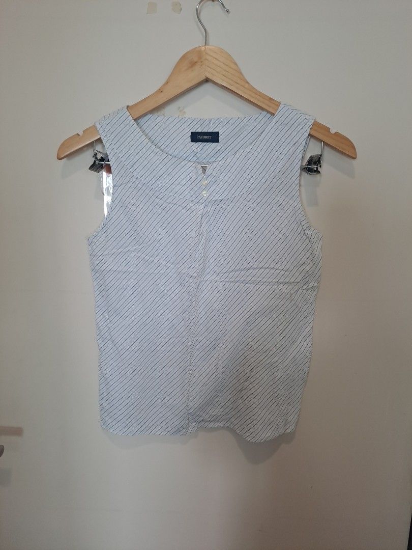 Favorite sleeveless (Category: Sleeveless) located in Manila. Submitted by joanbalde39643 (Listing ID 1465605788, Image 1). Description: This is favorite xs.. a lightweight, striped sleeveless blouse or shell top featuring a distinctive diagonal pattern alignment..
