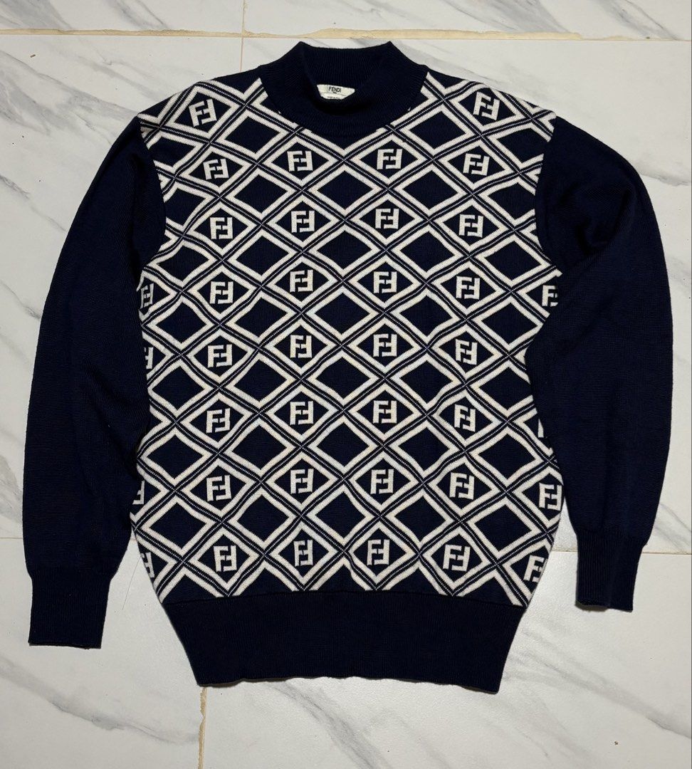 Fendi Navy Blue Monogram Diamond Knit Sweater (Category: Longsleeves) located in Baguio. Submitted by thriftedbaguio (Listing ID 1465671567, Image 1). Description: Excellent Condition Size Medium Tagged Dimensions 21*27 Color rate 10.