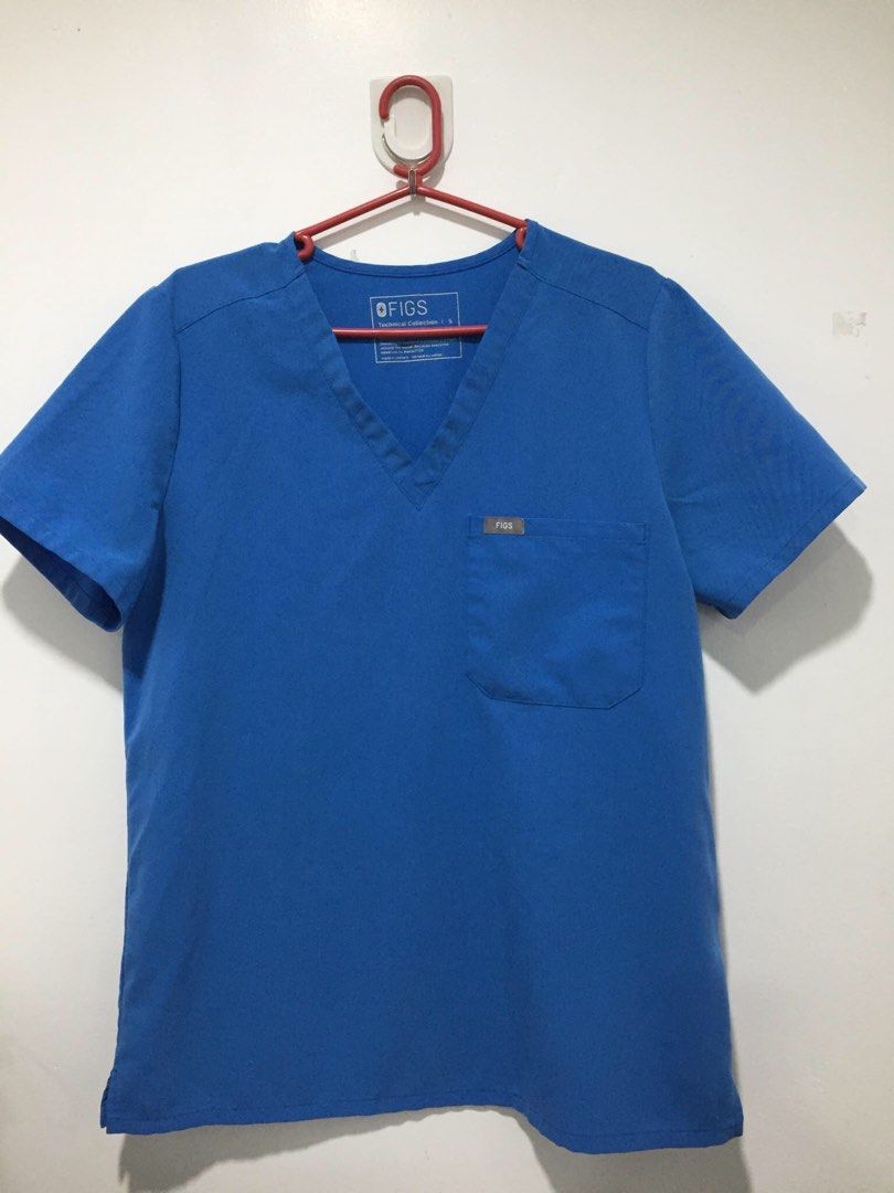 Figs Catarina scrub top, carpi blue, small (Category: Others Tops) located in Tarlac. Submitted by mys0726 (Listing ID 1465752557, Image 1). Description: Us bale Small, capri blue,limited edition (po#2595)lighter version of royal blue Bl 38 inches S 15 inches L 27 inches.