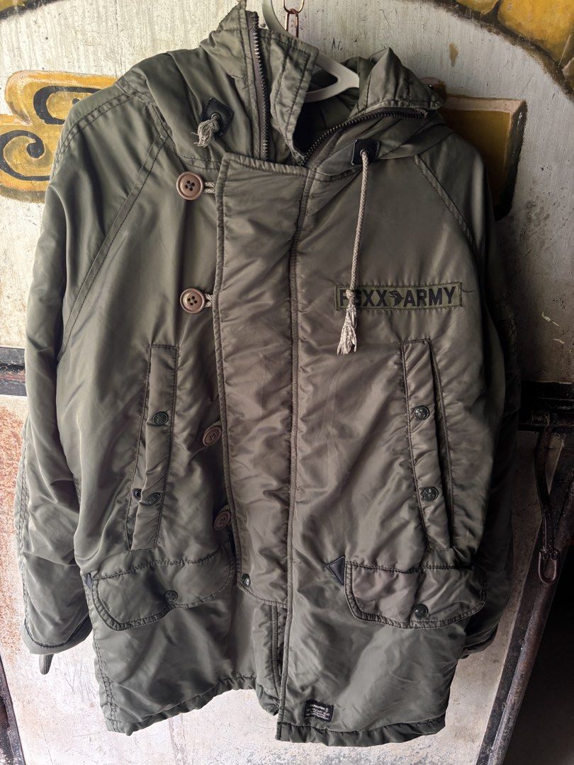 fingercroxx Army Green Hooded Jacket Size M (Category: Coats, Jackets and Outerwear) located in Manila. Submitted by joshuadexter-manuel (Listing ID 1465668558, Image 1). Description: - Brand: fingercroxx - Color: Army green - Size: Medium (Regular fit) - Closure: Front zipper and button - Details: Multiple pockets, FGXX ARMY chest patch, drawstring hood and hem - Style: Warm, chunky, and great for layering over hoodies and sweaters.