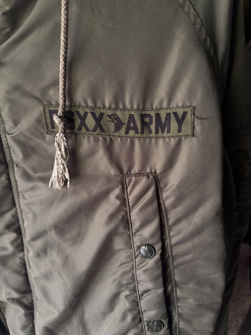 fingercroxx Army Green Hooded Jacket Size M (Category: Coats, Jackets and Outerwear) located in Manila. Submitted by joshuadexter-manuel (Listing ID 1465668558, Image 3). Description: - Brand: fingercroxx - Color: Army green - Size: Medium (Regular fit) - Closure: Front zipper and button - Details: Multiple pockets, FGXX ARMY chest patch, drawstring hood and hem - Style: Warm, chunky, and great for layering over hoodies and sweaters.
