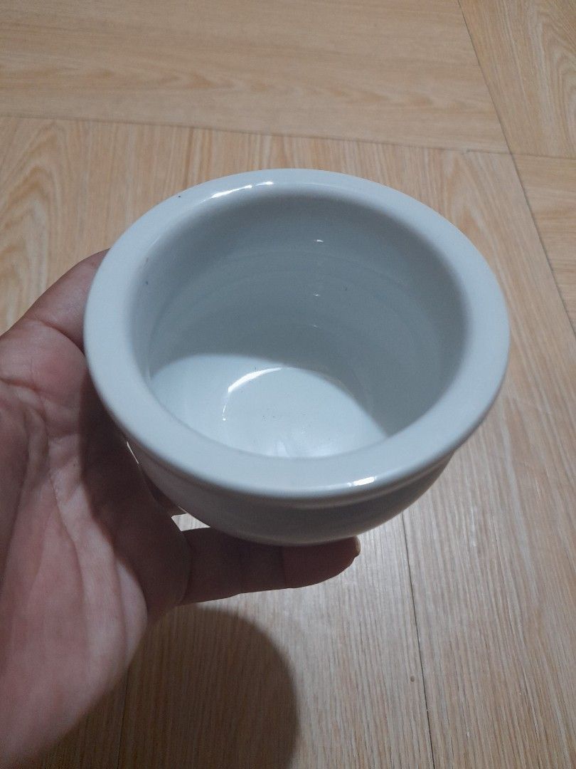 Footed Ceramic incense Burner (Category: Pots & Planters) located in Bocaue. Submitted by marajapansurplus (Listing ID 1465684372, Image 2). Description: - Style: Clean minimalist white ceramic with a smooth glaze - Design: Round shape with a wide rim, deep opening, and three sturdy feet - Stability: Stands securely on any flat surface .