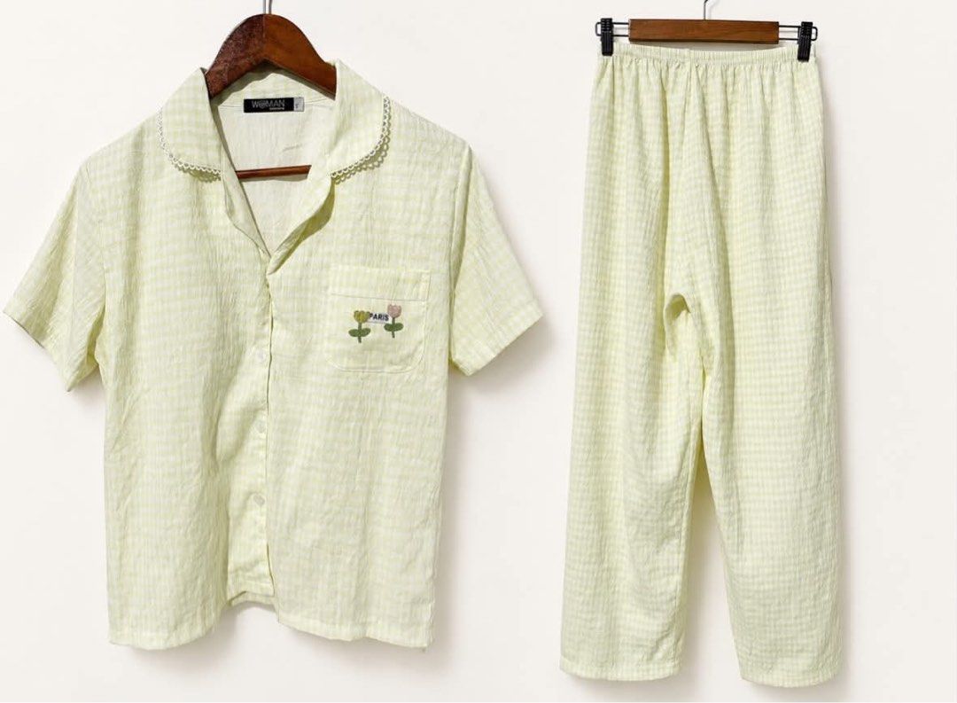 for take all 550 only / size S-L / used once (Category: Sets or Coordinates) located in San Pedro. Submitted by rysjvy19 (Listing ID 1465726135, Image 1). Description: - Light green gingham two-piece pyjama set - Short-sleeve button-down top with lapel collar, pocket, tulip embroidery, and Paris lettering - Matching trousers with a comfortable elastic waistband - Soft and lightweight cotton material - Ideal for sleeping or lounging at home.