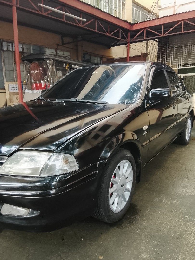 Ford Laser 1.6 Ghia (A) (Category: Used Cars) located in Muntinlupa City. Submitted by calmgem_4c3336 (Listing ID 1465701479, Image 2). Description: Ford Lynx 1.6 GSI 2002 AT model Complete original papers (OR Cr ID DOS) 2 keys REGISTERED 2026-2027 AUTOMATIC TRANSMISSION BRAND NEW BATTERY JULY2026 4 NEW kyb SHOCK ABSORBER 4 BRAND NEW TIRES WALANG KALAMPA New LTO issued white plates cold AC HID HEADLIGHTS Black tint FOG LAMP Power steering Power d