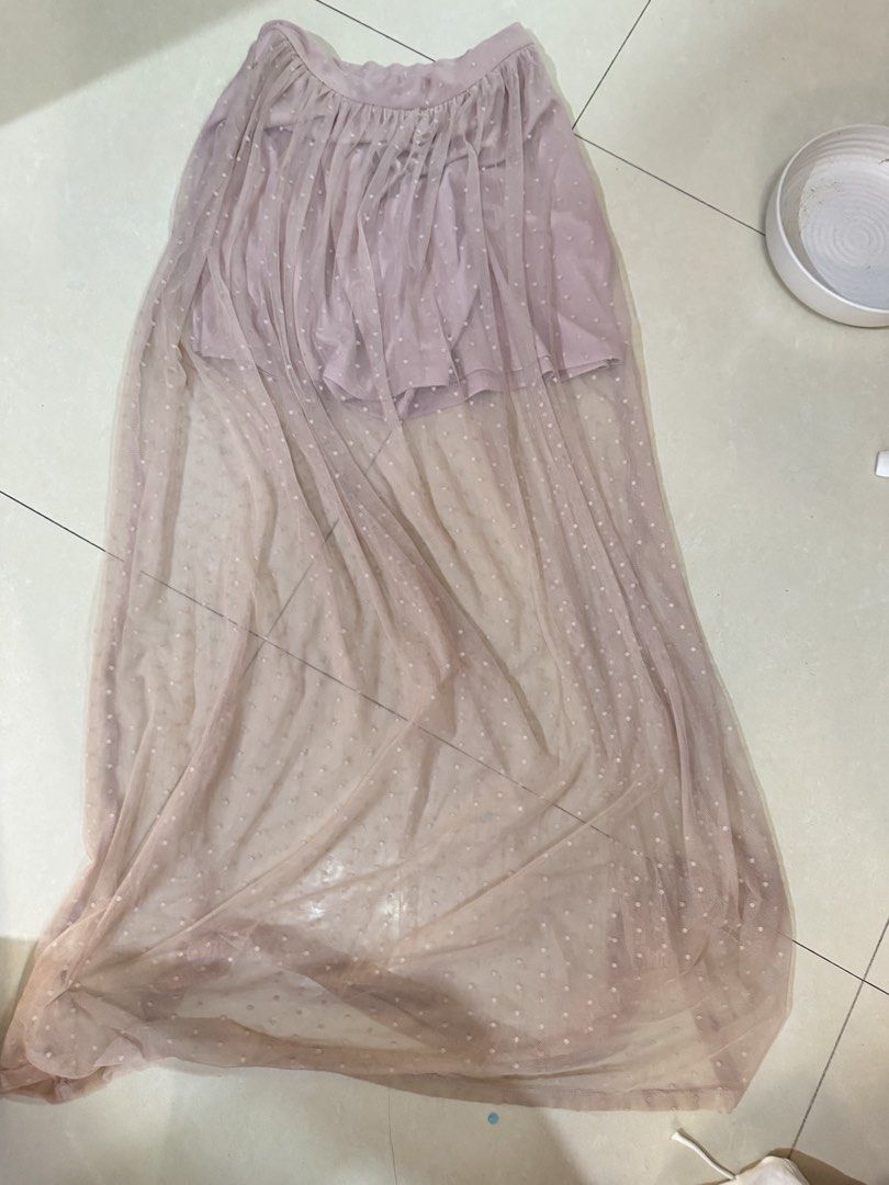 Forever 21 Pink Mesh Polka Dot Maxi Skirt (Category: Skirts) located in Quezon City. Submitted by sweetlyluxe (Listing ID 1465606464, Image 1). Description: - Brand: Forever 21 - Size: S - Color: Pink with all-over cute polka dots - Material/Design: Sheer mesh overlay with a built-in inner lining for safe, comfortable wear - Closure: Hidden back zipper for easy wearing - Style: Float, flowy, and dreamy maxi length.