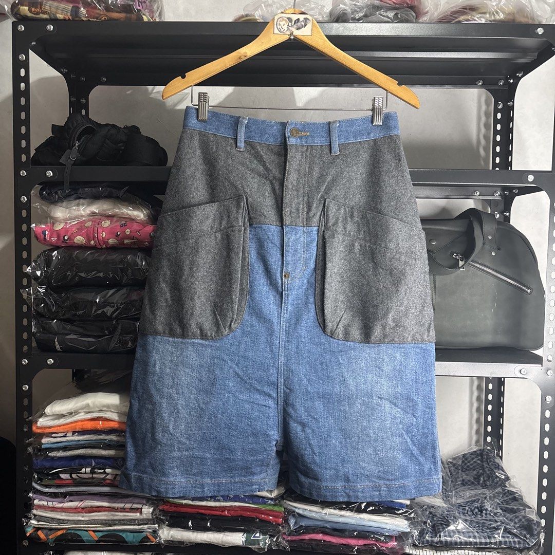 Frapbois - Denim and Wool Patchwork Shorts (Category: Shorts) located in Cavite. Submitted by goodstayojan.cvt (Listing ID 1465720321, Image 1). Description: Frapbois - Wool Denim Dropcrotch Shorts 0 on tag(14.5 x 26) Verygood-Excellent Condition No flaws - Brand: Frapbois (Japanese streetwear) - Material: Blue denim mixed with grey wool panels - Design: Unique hybrid patchwork style with large front pockets and pleated back detail - Closure: But
