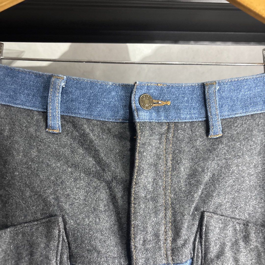 Frapbois - Denim and Wool Patchwork Shorts (Category: Shorts) located in Cavite. Submitted by goodstayojan.cvt (Listing ID 1465720321, Image 2). Description: Frapbois - Wool Denim Dropcrotch Shorts 0 on tag(14.5 x 26) Verygood-Excellent Condition No flaws - Brand: Frapbois (Japanese streetwear) - Material: Blue denim mixed with grey wool panels - Design: Unique hybrid patchwork style with large front pockets and pleated back detail - Closure: But
