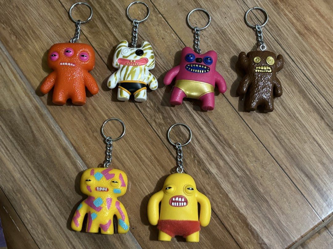 FUGGLER KEYCHAINS (Category: Figurines & Statues) located in Manila. Submitted by kishnimu__ (Listing ID 1465665549, Image 1). Description: P200 each, can low if getting 2 or more pa All with bag & collectors guide RFS: duplicates & decluttering Loc 📍: Cainta, Rizal JnT • Lalamove.
