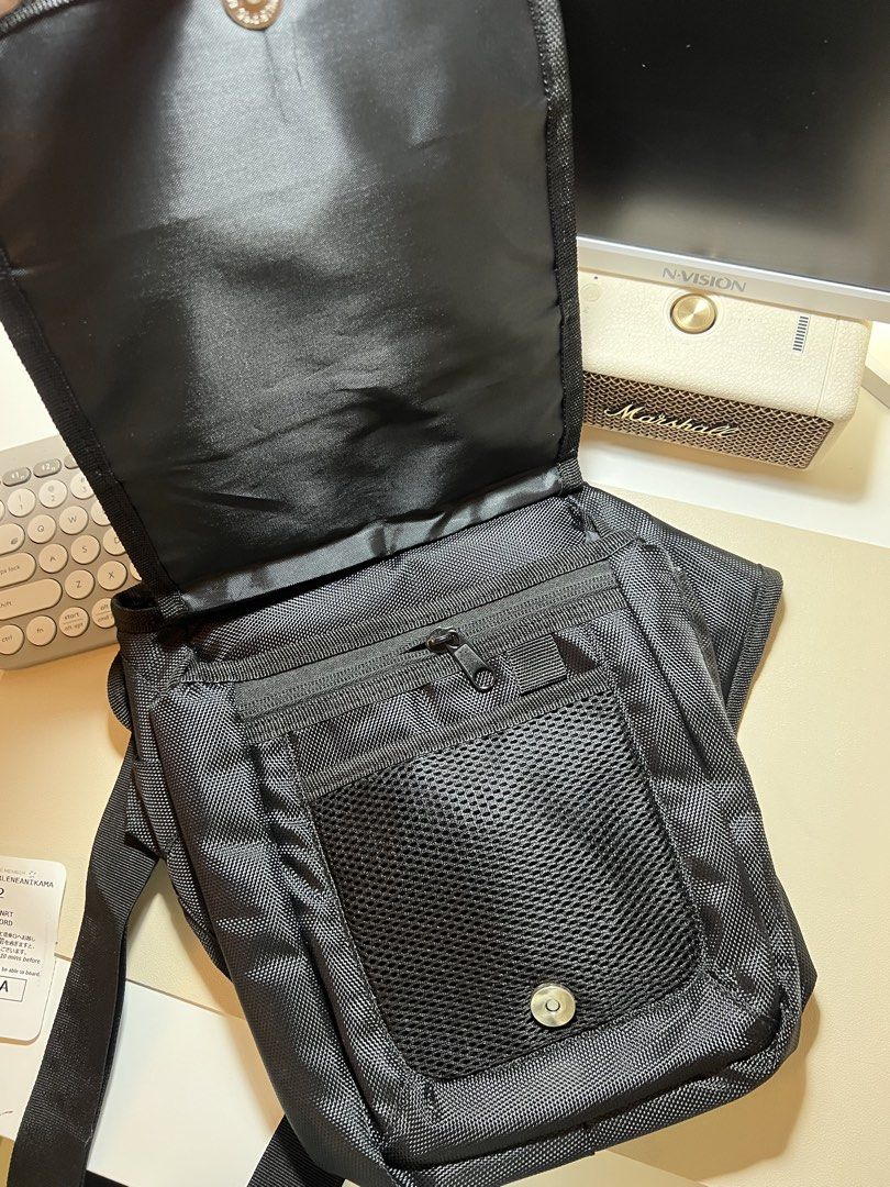 Fujifilm X Series Black Messenger Camera Bag (Category: Camera Bags & Carriers) located in Las Pinas. Submitted by csco.mnl (Listing ID 1465673934, Image 2). Description: - Brand: Fujifilm X Series - Color: Classic Black - Material: Durable, weather-ready nylon - Storage: Front zipper pocket, mesh pocket under flap, and main compartment with inner divider sleeves - Comfort: Adjustable shoulder strap with padded support - Condition: Clean inside a