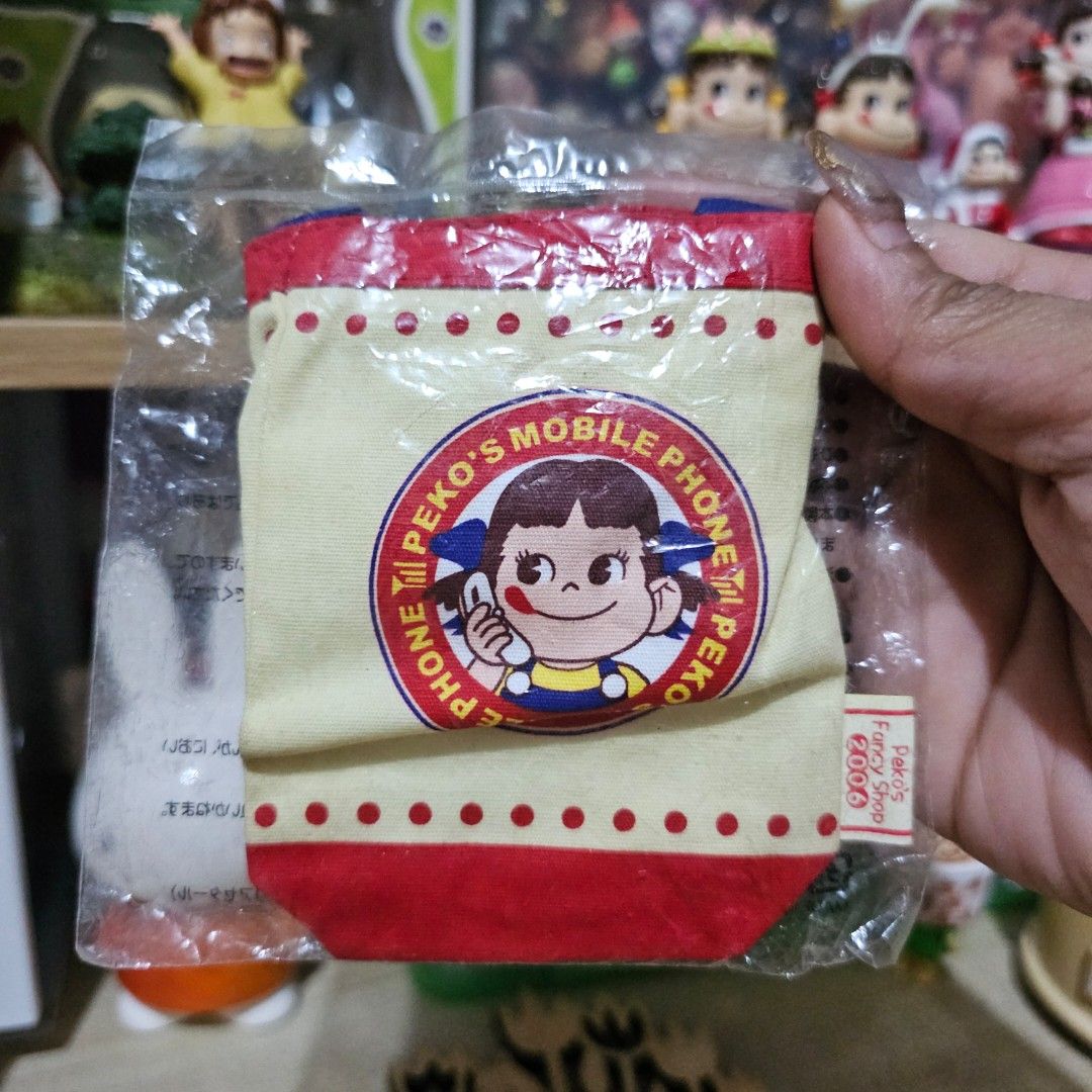 Fujiya Peko-chan's Mini Pouch Bag (Category: Purses & Pouches) located in Manila. Submitted by lovelylovesjapan (Listing ID 1465628935, Image 1). Description: 🌸The item is on-hand and authentic from Japan 🌸Mode of Payment (MOP): GCASH/Bank Transfer 🌸Mode of Delivery (MOD): J&T or Lalamove (Shipping every Saturday and Sunday) Notes: 🩷Breakable items are packed with care and caution. Seller will not be held liable for any damages incurred by th