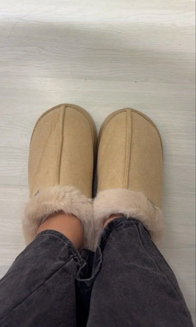 Fuzzy Winter Slippers Off-White Size EU 38 (Category: Slippers and slides) located in Quezon City. Submitted by eira_arie (Listing ID 1465736706, Image 1). Description: - Color: Off-white - Condition: Brand new / Great for indoor use - Sizing: 38 - Features: Super lightweight with a cozy interior lining - Perfect for walking around the house on cold floors.