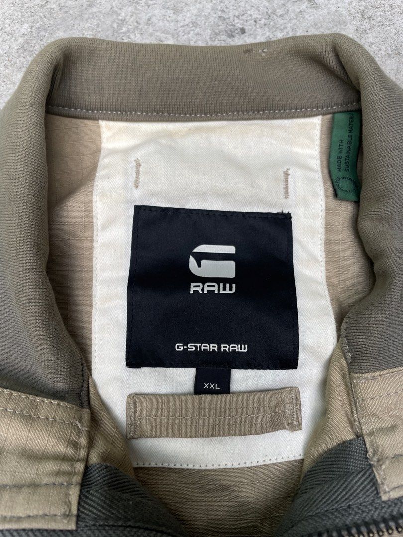 G STAR RAW COMBAT TAPE JACKET (Category: Coats, Jackets and Outerwear) located in Taguig. Submitted by garmentsrevive (Listing ID 1465596489, Image 3). Description: G STAR RAW COMBAT TAPE JACKET 27 x 32 Excellent condition No issue Need wash only -1k + sf Taguig City.