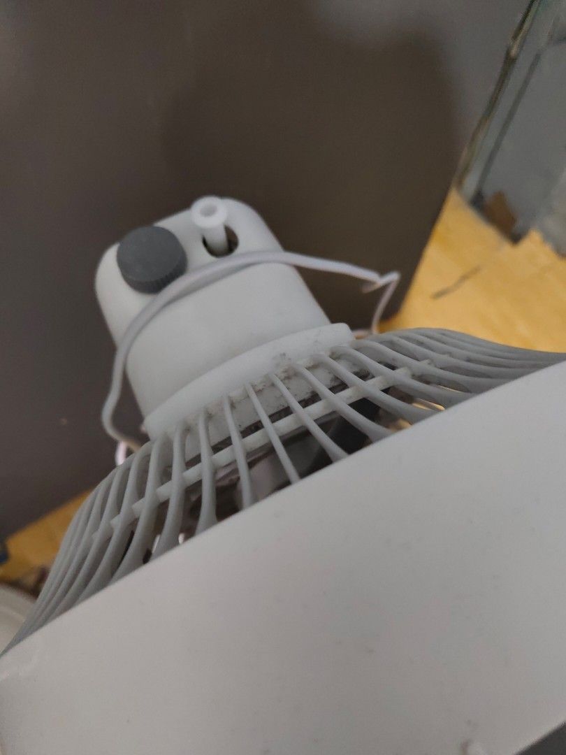 Gaabor Standing Electric Fan White Grey (Category: Fans) located in San Juan City. Submitted by jzurc19 (Listing ID 1465626135, Image 2). Description: - Brand: Gaabor Standing Electric Fan - Color: Sleek white with a matching white pole and base - Design: Modern spiral grey grille pattern with central logo badge - Base: Sturdy circular white base for reliable stability - Plug: Standard two-prong plug attached - Condition: Like Brand new and ready