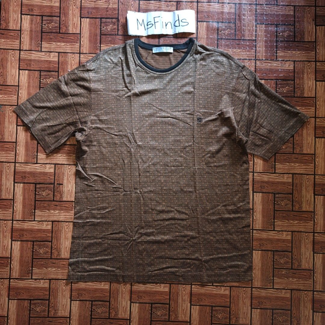 Givenchy - Men's T-Shirt Brown Monogram All-Over (Category: Tshirts & Polo Shirts ) located in Naga. Submitted by beauty_msfinds (Listing ID 1465663135, Image 1). Description: Givenchy - Men's T-Shirt Brown Monogram All-Over - Brown Givenchy T-shirt - Monogram All-over - Iconic Givenchy 4-G logo embroidered on chest - Classic crew neck Size: L on tag (can fit Large to XL) Width: 21.5 inches Length: 29 inches Color rate : 9.5/10 Excellent Conditio