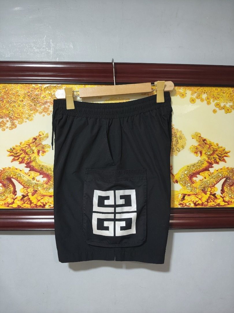 Givenchy big pocket shorts (Category: Luxury Apparel) located in Paranaque City. Submitted by reymart_1 (Listing ID 1465673030, Image 2). Description: -features with Big logo with big pockets -like new condition -like new color rate -30-36 waistline adjustable -18 on length -12 on hem -pm to purchase.