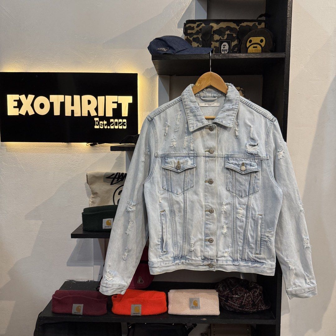 Givenchy Paris Distressed Light Wash Denim Cuban Fit Jacket (Category: Coats, Jackets and Outerwear) located in Manila. Submitted by carbungcoalex (Listing ID 1465742118, Image 1). Description: GIVENCHY DISTRESS DENIM JACKET 20 by 25 Good Condition Complete tags missing button 2K CLAIM.