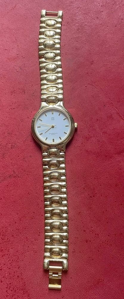 Givenchy Paris Vintage 90's Watch (Category: Women's Watches) located in Paranaque City. Submitted by juan_luma (Listing ID 1465672383, Image 3). Description: Givenchy Paris Vintage 90's Watch GV-MGBRW-2040T Authentic Licensed Japanese Quartz Movement Size 34 mm approx Bracelet size 7" wrist Running, keeping time Selling as is.