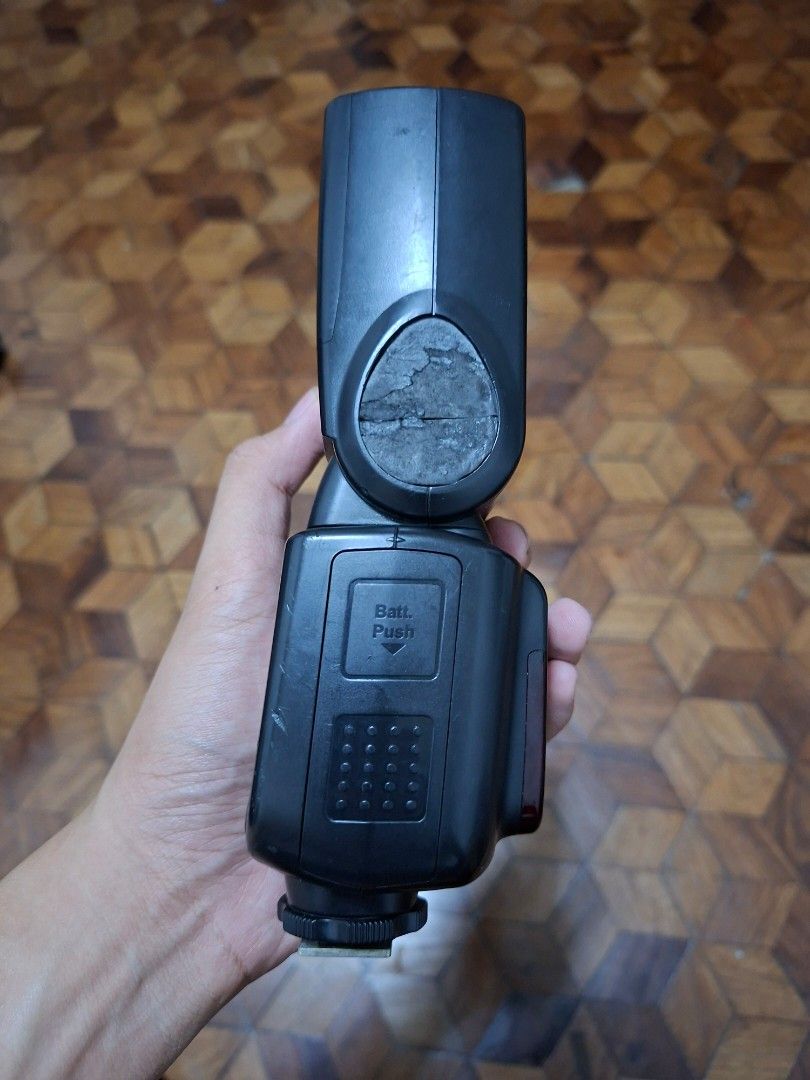 Godox V860II-C Speedlite Camera Flash (Category: Flashes) located in Santa Rosa. Submitted by spinetram53316 (Listing ID 1465677614, Image 3). Description: - Item: Godox V860IIC Flash Unit for Canon cameras - Features: Clear LCD screen with standard control dial and buttons, front red sub-flash panel - Ports: Micro USB port, sync cord jack, and wireless port on the side - Condition: Normal wear marks on the plastic body from regular shooting sess