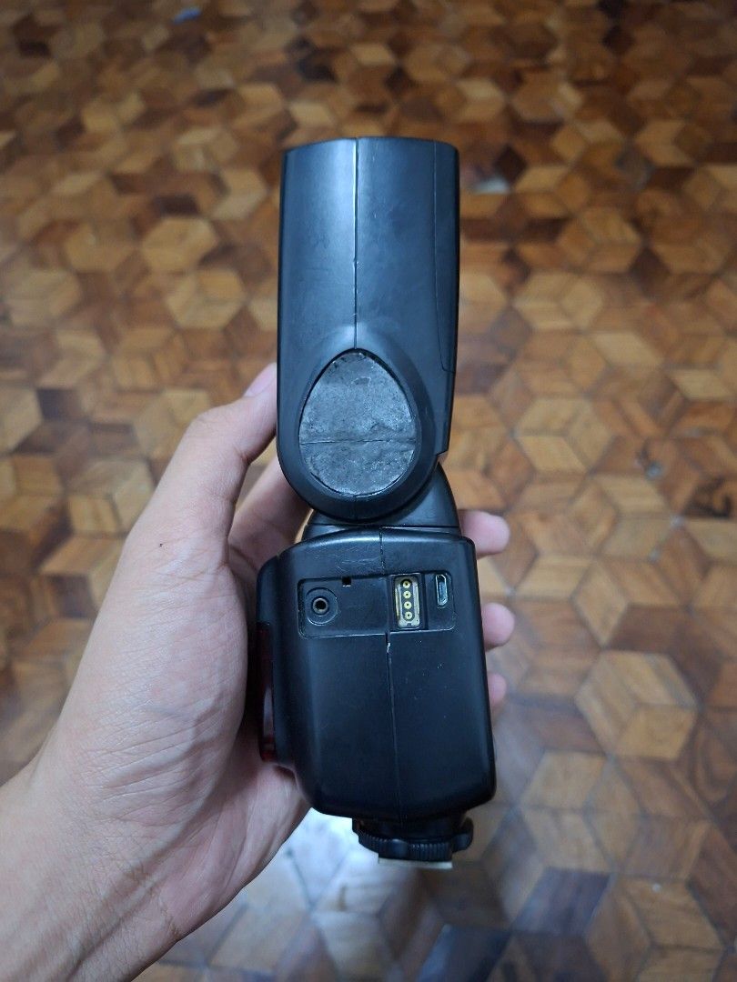 Godox V860II-C Speedlite Camera Flash (Category: Flashes) located in Santa Rosa. Submitted by spinetram53316 (Listing ID 1465677614, Image 2). Description: - Item: Godox V860IIC Flash Unit for Canon cameras - Features: Clear LCD screen with standard control dial and buttons, front red sub-flash panel - Ports: Micro USB port, sync cord jack, and wireless port on the side - Condition: Normal wear marks on the plastic body from regular shooting sess