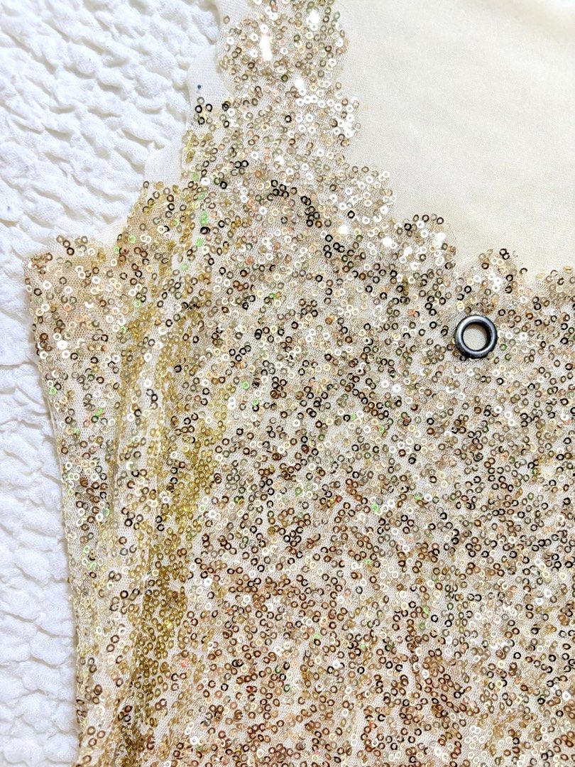 Gold sequin sleeveless (Category: Sleeveless) located in Manila. Submitted by belles.clos3t (Listing ID 1465656149, Image 3). Description: Gold sequin top with a subtle sparkle that catches the light beautifully. A fun statement piece for adding a little glam to any outfit. ✨.