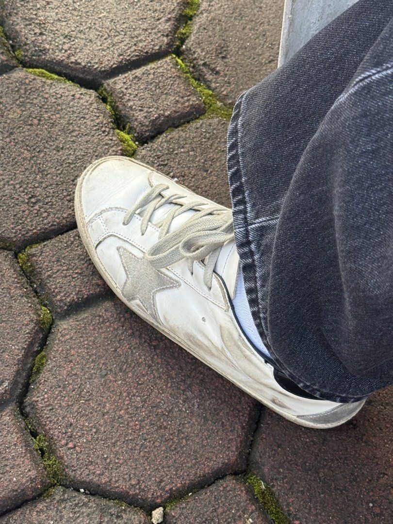 Golden goose superstar (black tab) (Category: Sneakers & Footwear) located in Santo Tomas. Submitted by oliviad3an (Listing ID 1465758640, Image 2). Description: - authentic, bought from rock n sole solenad - lightly used although there’s a mini sole rip (seen on last pic) - i lost dust bag na so no dust bag - will do professional cleaning before sending it to the buyer :)) - ORIG PRICE: ₱30,000 RFS: will buy a new GGDB Pair .