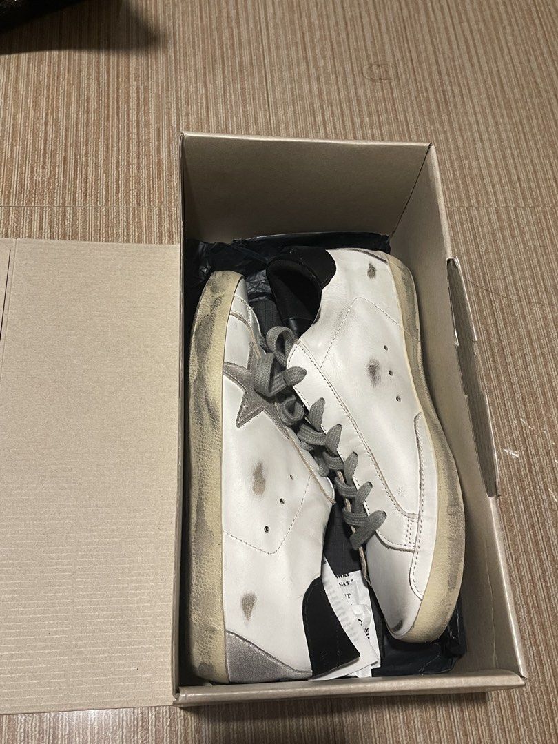 Golden goose superstar (black tab) (Category: Sneakers & Footwear) located in Santo Tomas. Submitted by oliviad3an (Listing ID 1465758640, Image 1). Description: - authentic, bought from rock n sole solenad - lightly used although there’s a mini sole rip (seen on last pic) - i lost dust bag na so no dust bag - will do professional cleaning before sending it to the buyer :)) - ORIG PRICE: ₱30,000 RFS: will buy a new GGDB Pair .