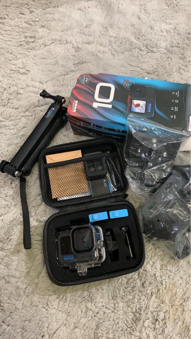 GoPro HERO10 Black with Case and Accessories Bundle (Category: Cameras) located in Zamboanga. Submitted by lykamas7599933 (Listing ID 1465727062, Image 1). Description: - Model: GoPro Hero 10 Black with powerful GP2 processor - Video & Photo: Records in 5.3K60 and 4K120 resolution, captures 23MP photos - Durability: Waterproof down to 33 feet - Complete Bundle: Includes original box, protective housing case, portable storage case, selfie stick tr