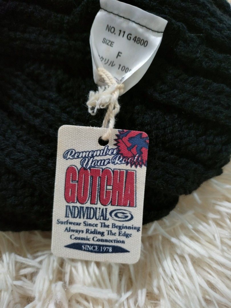Gotcha Black Cable Knit Beanie (Category: Beanies) located in Abucay. Submitted by naixrazion199x (Listing ID 1465709421, Image 3). Description: - Brand: Gotcha - Color: Black - Style: Cable knit beanie with front fold and embroidered logo patch - Size: One size fits all - Material: 100% acrylic - Condition: Brand new with original tags attached.